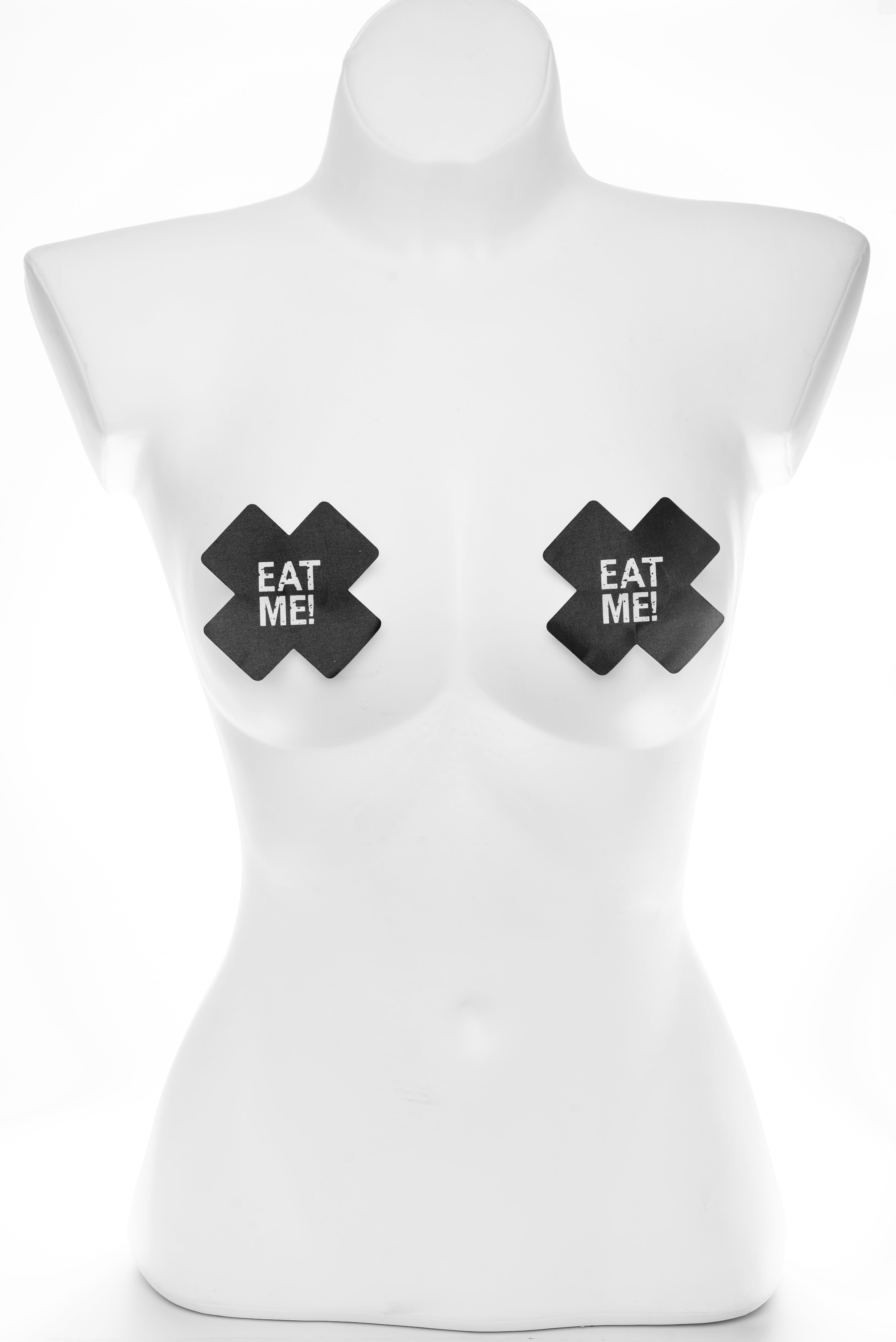 Juodi kryžiaus formos lipdukai speneliams su užrašu „EAT ME!“
